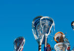 Lacrosse Sticks In Air